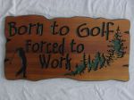 Wooden sign engraved golfer